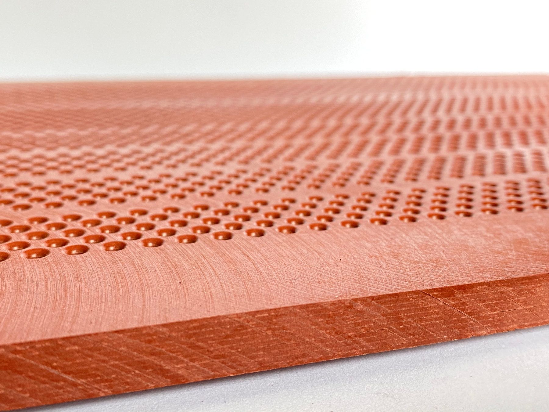 Perforated comber board